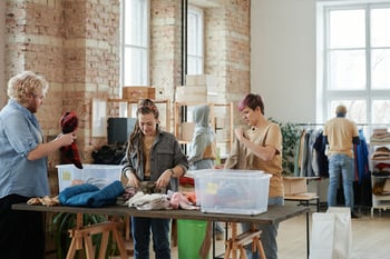 Recruiting volunteers to sort clothing donations