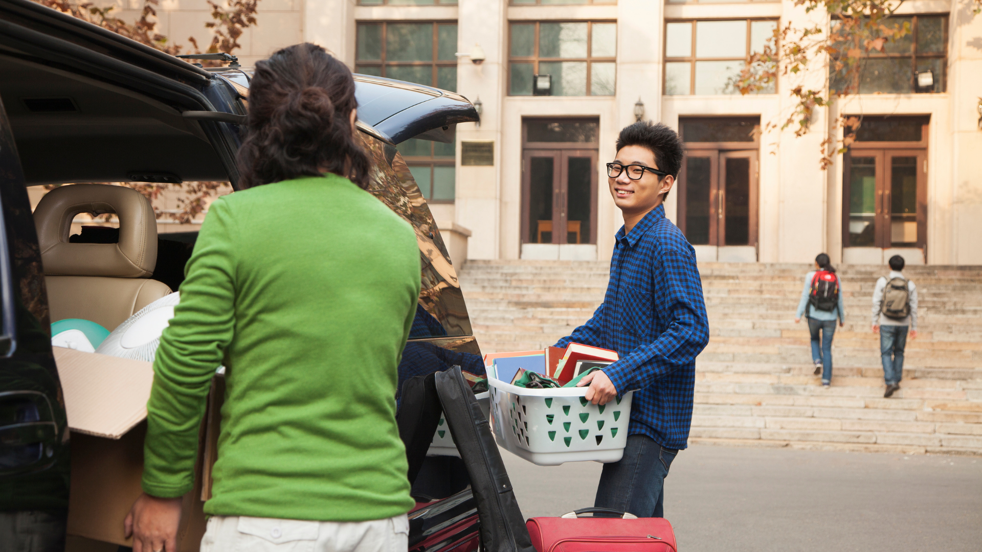 Student moves out of college dorm at the end of the semester during housing check-out