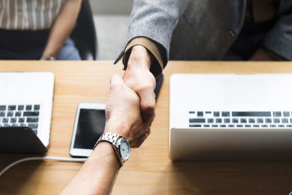 shaking hands after getting hired